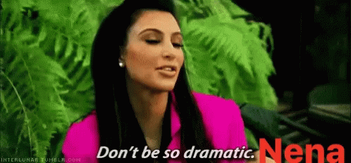 A Woman In A Pink Shirt Is Saying " Don 'T Be So Dramatic " GIF
