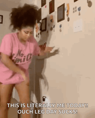 A Woman In A Pink Shirt Is Standing In Front Of A Wall And Saying This Is Literally Me Today ! GIF