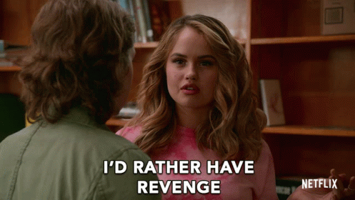 A Woman In A Pink Shirt Says I 'D Rather Have Revenge While Talking To A Man GIF