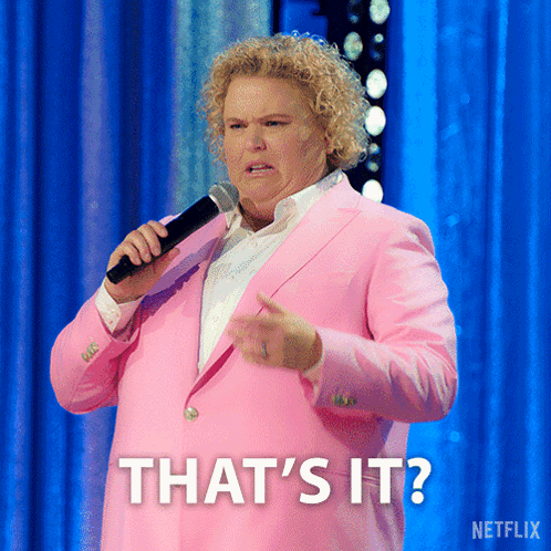 A Woman In A Pink Suit Is Holding A Microphone And The Caption Says That 'S It GIF