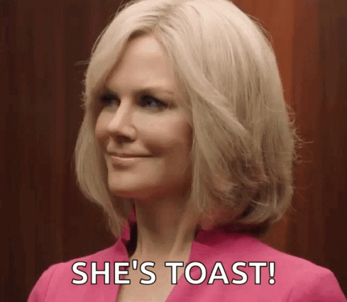 A Woman In A Pink Suit Says She 'S Toast . GIF