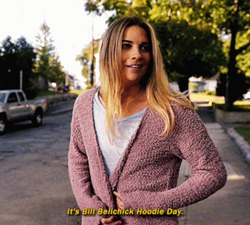 A Woman In A Pink Sweater Says It 'S Bill Belchick Hoodie Day GIF