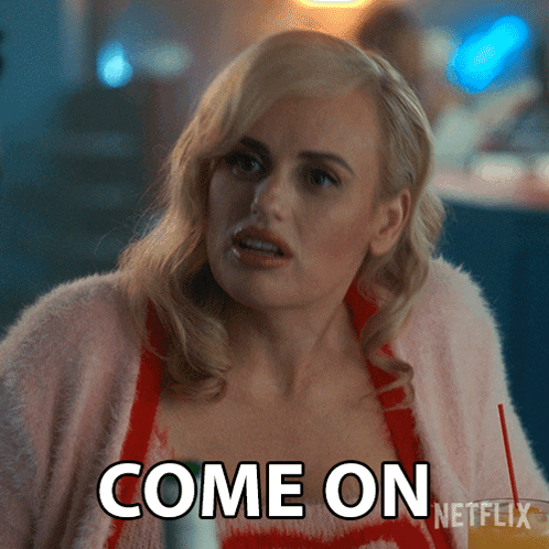A Woman In A Pink Sweater With The Words Come On Netflix On Her Chest GIF