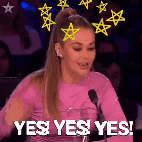 A Woman In A Pink Top Is Saying Yes Yes Yes GIF