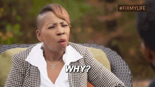 A Woman In A Plaid Jacket Is Sitting On A Couch And Asking Why . GIF
