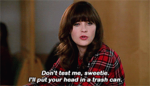 A Woman In A Plaid Shirt Says " Do N't Test Me Sweetie " GIF