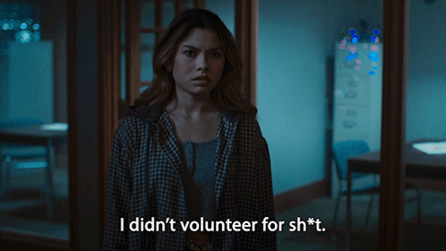 A Woman In A Plaid Shirt Says I Didn 'T Volunteer For Sh * T GIF