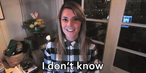 A Woman In A Plaid Shirt Says I Don T Know GIF