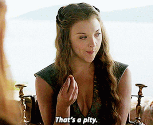 A Woman In A Plunging Neckline Is Talking To Another Woman And Says That 'S A Pity . GIF