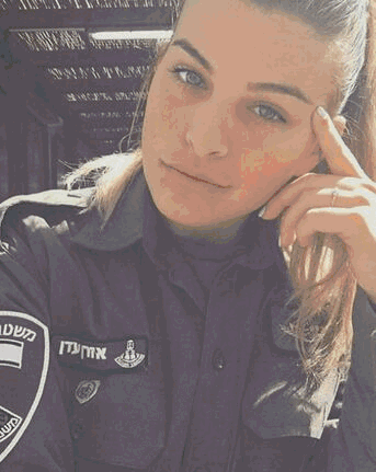 A Woman In A Police Uniform Is Looking At The Camera With Her Hand On Her Forehead . GIF