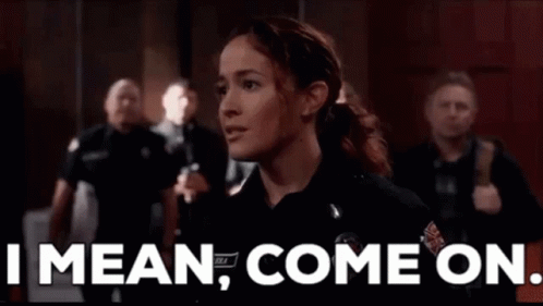 a woman in a police uniform is standing in front of a crowd of people and says `` i mean , come on . ''