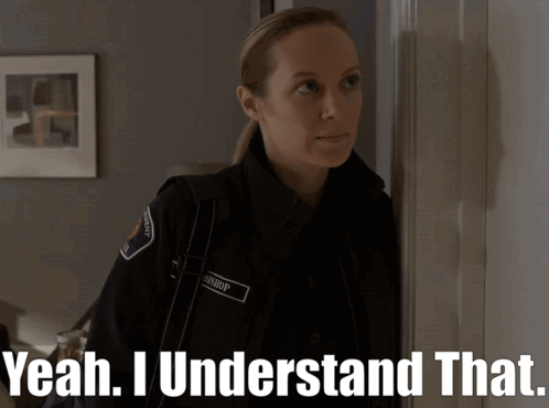 A Woman In A Police Uniform With The Words Yeah I Understand That On The Bottom GIF
