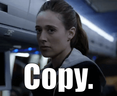 A Woman In A Ponytail Is Looking At The Camera With The Words Copy Written In White GIF