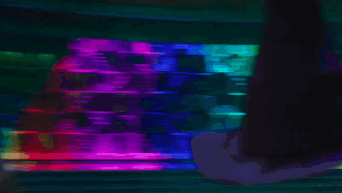 A Woman In A Purple Coat And Black Hat Is Standing In Front Of A Bar GIF