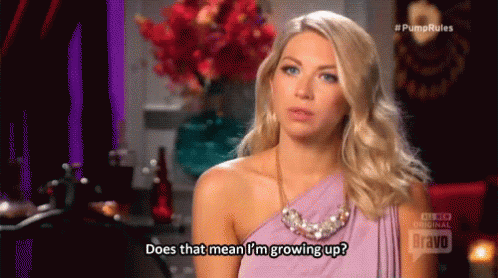 A Woman In A Purple Dress And Necklace Is Asking Does That Mean I 'M Growing Up ? GIF