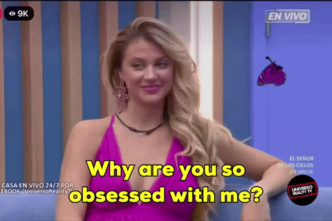 A Woman In A Purple Dress Is Being Asked Why Are You So Obsessed With Me GIF