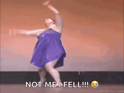 A Woman In A Purple Dress Is Dancing And Says Not Me I Fell ! GIF