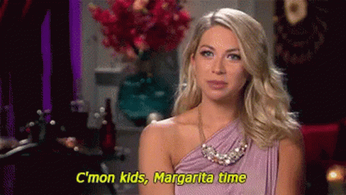 A Woman In A Purple Dress Is Saying C'mon Kids , Margarita Time . GIF