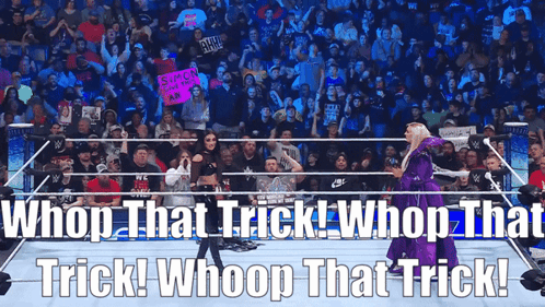 A Woman In A Purple Dress Is Standing In A Wrestling Ring With The Words Whoop That Trick Whoop That Trick GIF