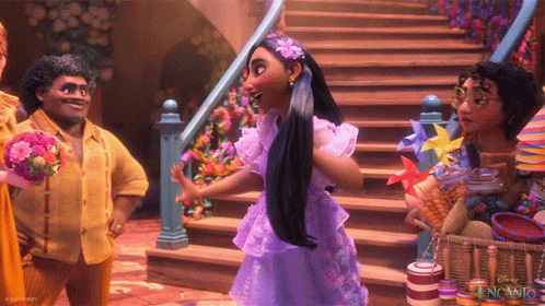 A Woman In A Purple Dress With A Flower In Her Hair Stands In Front Of Stairs GIF