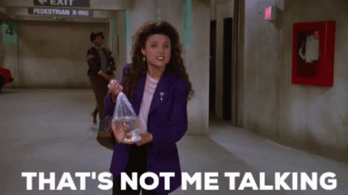 A Woman In A Purple Jacket Is Holding A Fish In A Plastic Bag . GIF