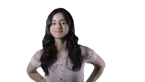 a woman in a purple off the shoulder top is smiling with her hands on her hips