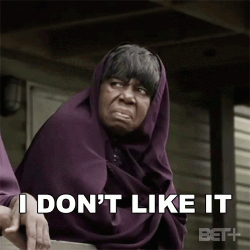 A Woman In A Purple Scarf Says I Don T Like It GIF