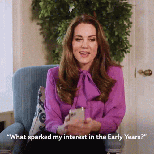 A Woman In A Purple Shirt Is Sitting In A Chair And Says " What Sparked My Interest In The Early Years GIF