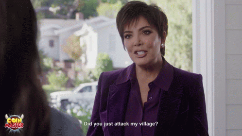 A Woman In A Purple Suit Is Talking To Another Woman And The Words Did You Just Attack My Village Are Visible GIF