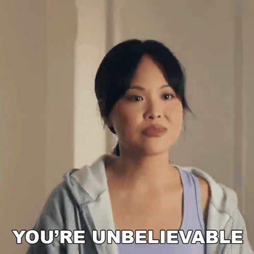A Woman In A Purple Tank Top Says You 'Re Unbelievable . GIF