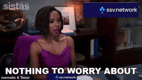 A Woman In A Purple Top Is Sitting At A Desk With A Ssv Network Logo Behind Her GIF