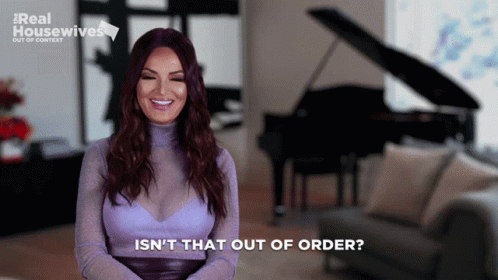 A Woman In A Purple Top Says Isn 'T That Out Of Order GIF