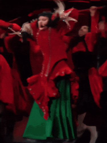 Women Dancing In Red Dress And Green Skirt GIF