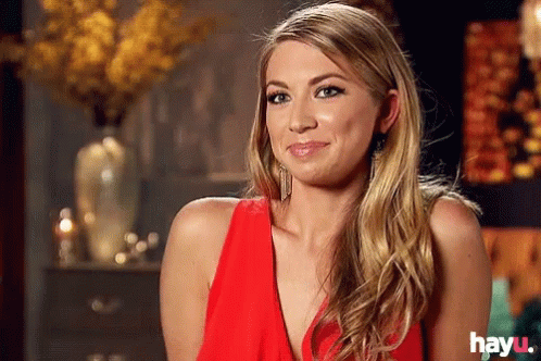 A Woman In A Red Dress Has Hayu Written On The Bottom GIF