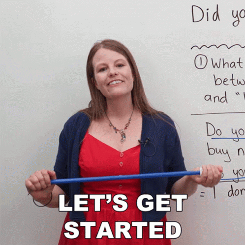 A Woman In A Red Dress Is Holding A Blue Stick In Front Of A Whiteboard That Says " Let 'S Get Started " GIF