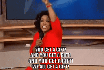 A Woman In A Red Dress Is Holding A Microphone And Saying You Get A Gift GIF
