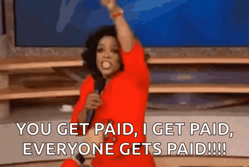 a woman in a red dress is holding a microphone and saying you get paid i get paid everyone gets paid .