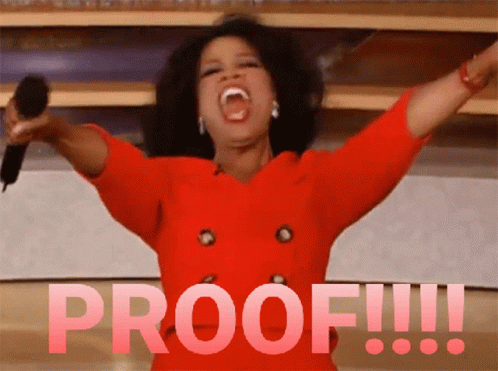 A Woman In A Red Dress Is Holding A Microphone And The Word Proof Is Behind Her GIF