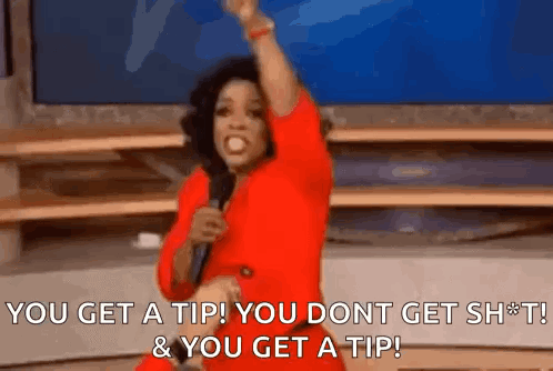 A Woman In A Red Dress Is Holding A Microphone In Her Hand And Shouting . GIF