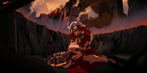 A Woman In A Red Dress Is Laying On A Man 'S Chest GIF