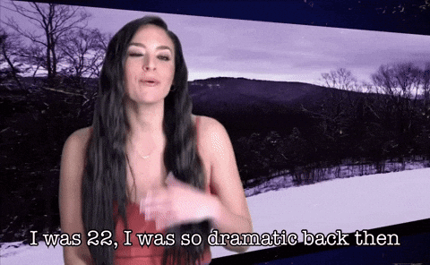 A Woman In A Red Dress Is Saying I Was 22 I Was So Dramatic Back Then GIF