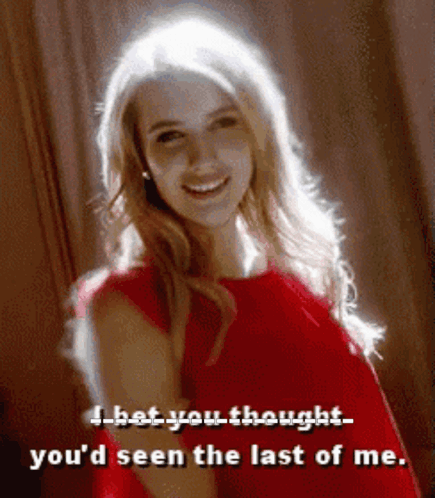 A Woman In A Red Dress Is Smiling And Says I Hat You Thought You 'D Seen The Last Of Me . GIF