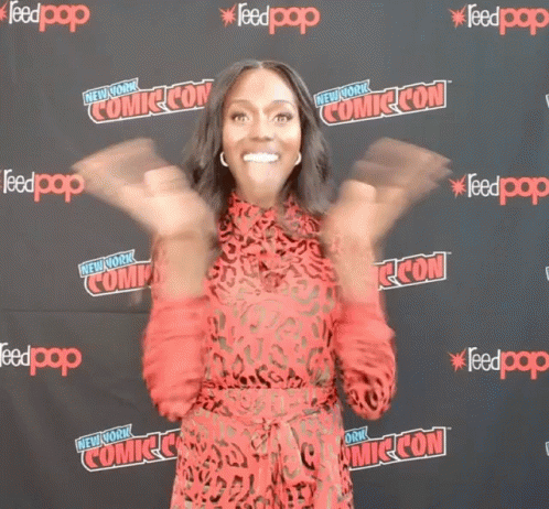 Woman In Red Dress At New York Comic Con GIF
