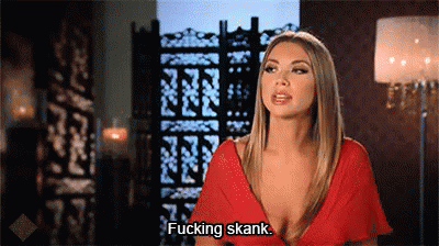 A Woman In A Red Dress Is Talking And Says Fucking Skank . GIF