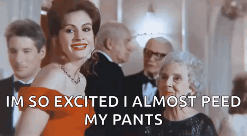 A Woman In A Red Dress Says " Im So Excited I Almost Peed My Pants " . GIF