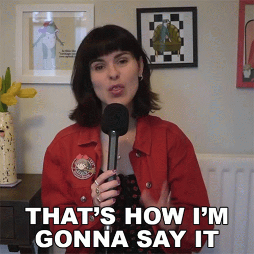 A Woman In A Red Jacket Is Holding A Microphone And Saying " That 'S How I 'M Gonna Say It " GIF