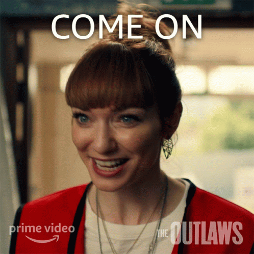 A Woman In A Red Jacket Is Smiling With The Words Come On Behind Her GIF