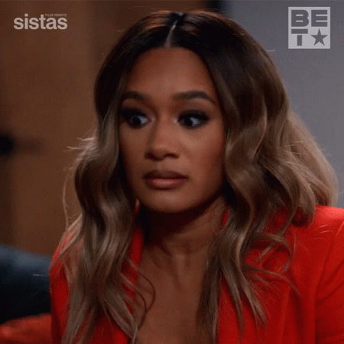 A Woman In A Red Jacket Says Exactly In Front Of A Sistas Logo GIF