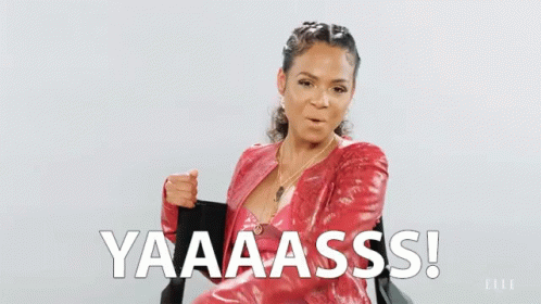 A Woman In A Red Jacket Says Yaaaa Ass On The Screen GIF