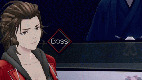 A Woman In A Red Jacket Stands In Front Of A Boss Button GIF